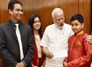 NRI boy donates prize money