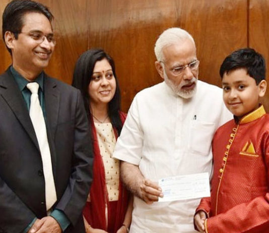 NRI boy donates prize money