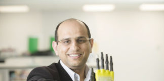 Scientist Creating Robotic Hand