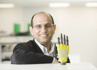 Scientist Creating Robotic Hand