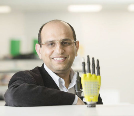 Scientist Creating Robotic Hand