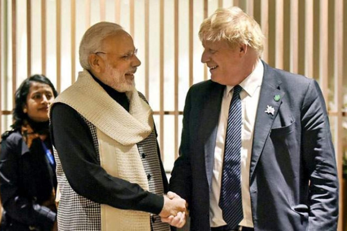 Modi Talks to UK PM